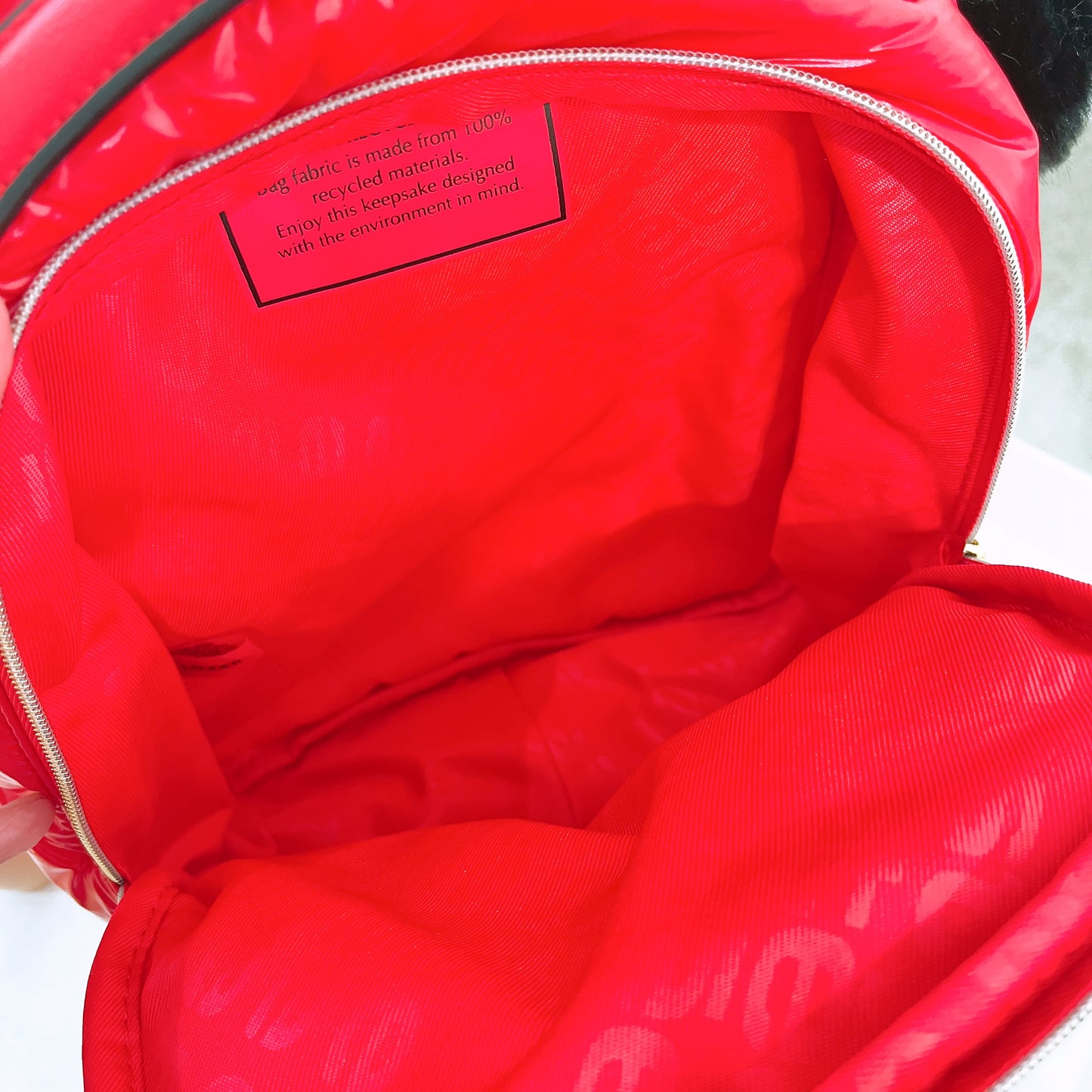 Estee Lauder Red Fluffy Backpack