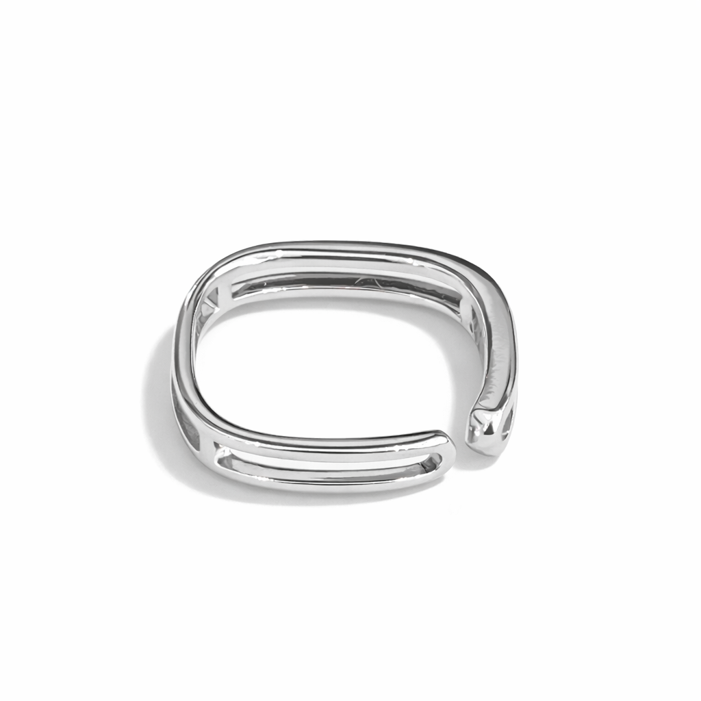 Opening ring with silver-inlaid gemstones