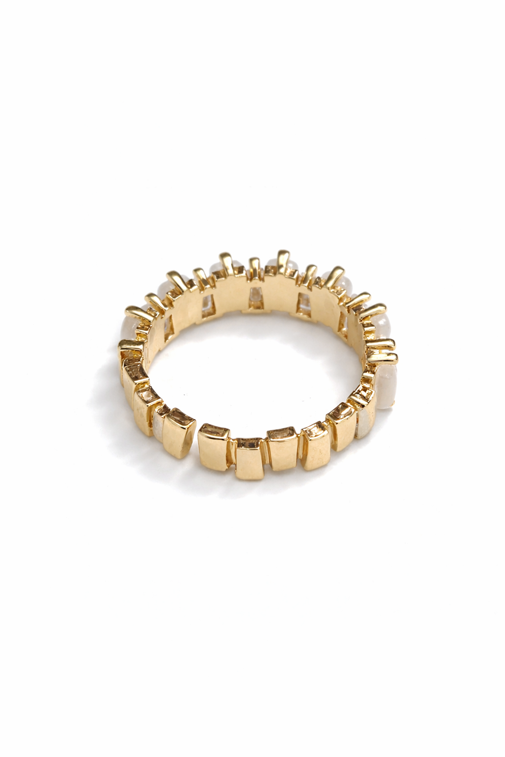 A golden open ring inlaid with zircon