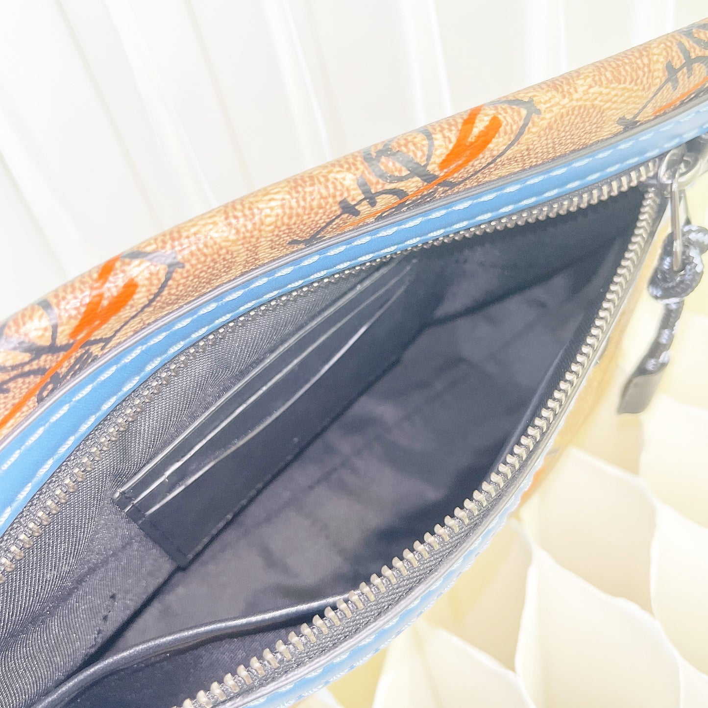 Coach Academy Clutch Sling Bag in Signature Canvas
