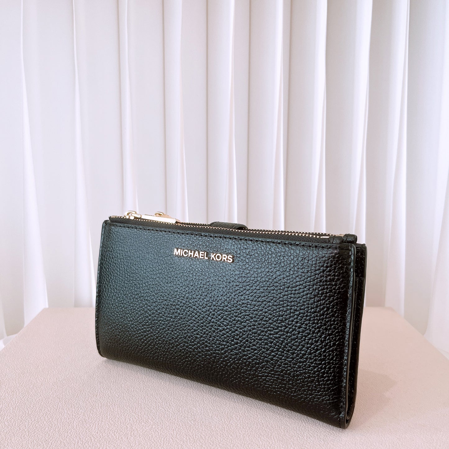 Michael Kors double-zip wallet in black