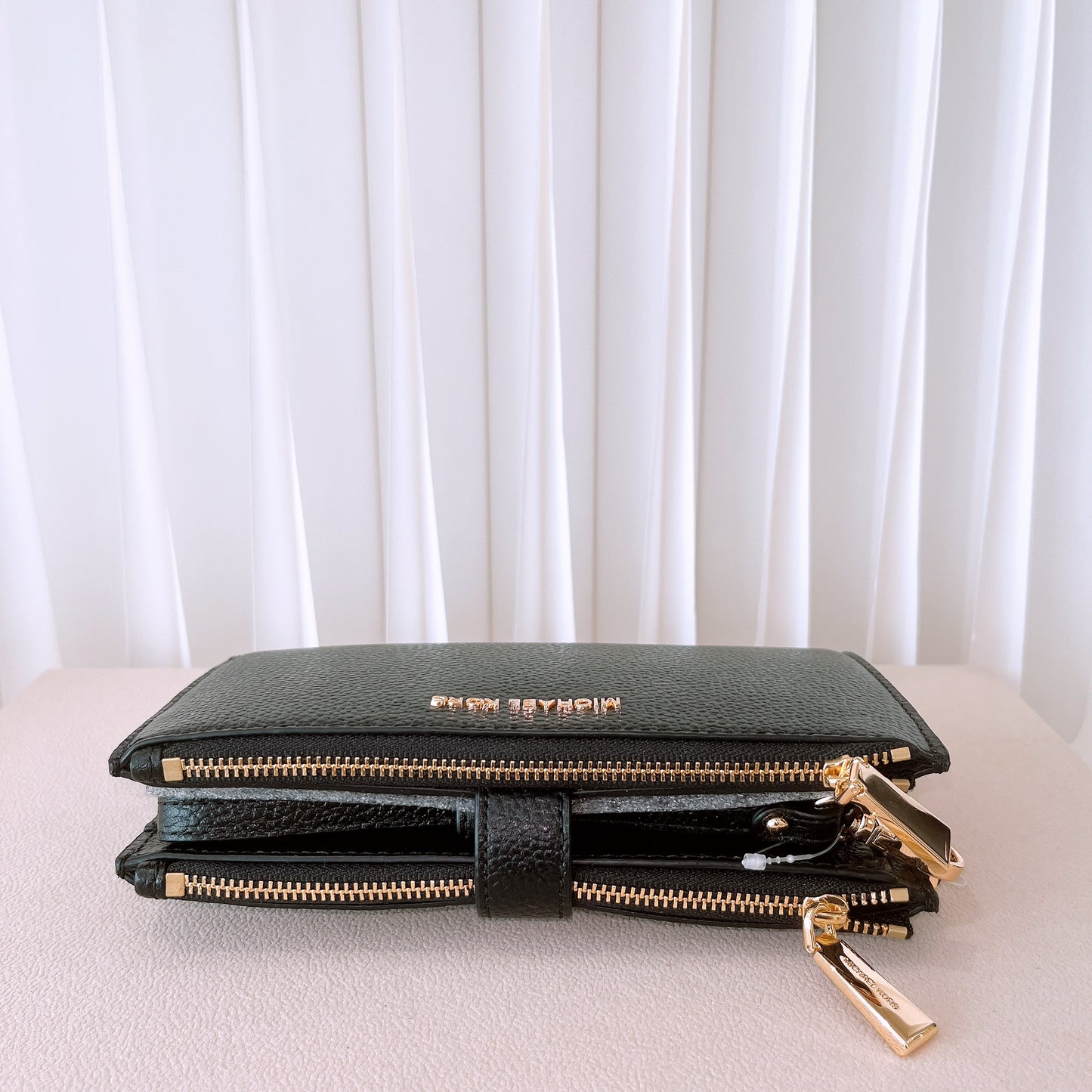 Michael Kors double-zip wallet in black