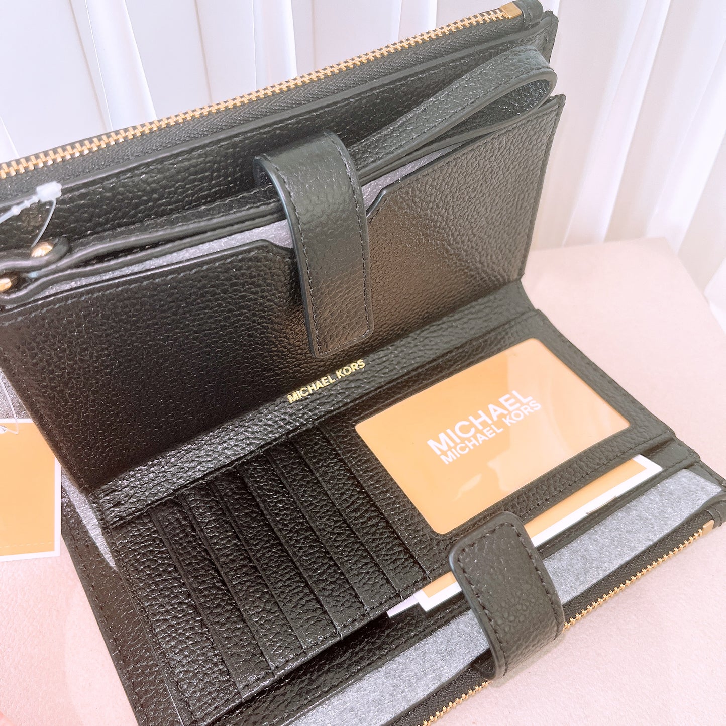 Michael Kors double-zip wallet in black