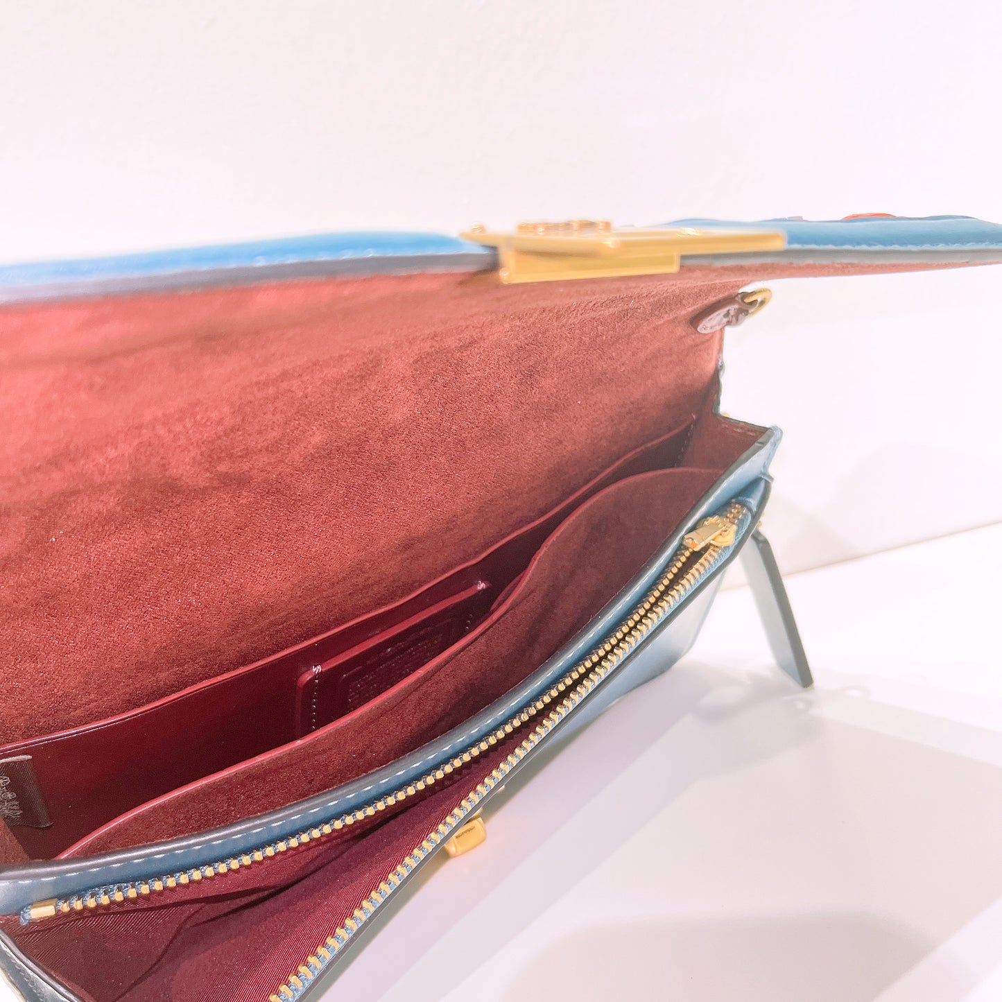 Coach Multicolor Woven Leather Hutton Clutch