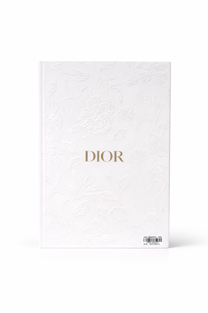 Dior White embossed notebook with the word J'adore