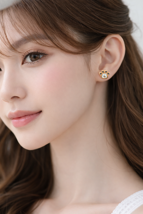 Gold claw-printed earrings