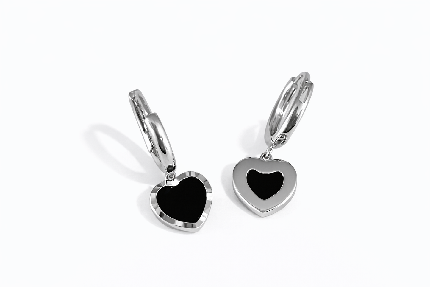 Black enamel heart-shaped pendant earrings