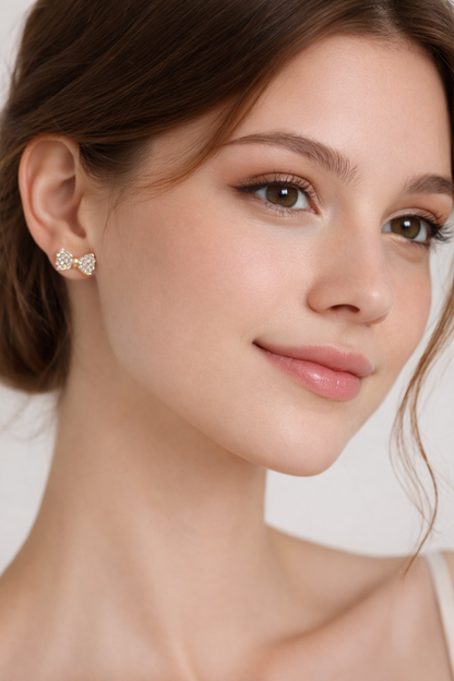 Diamond-encrusted bow stud earrings