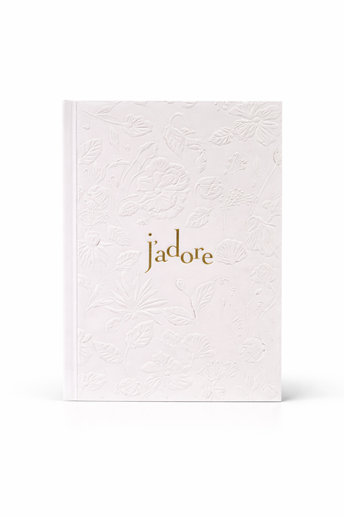 Dior White embossed notebook with the word J'adore