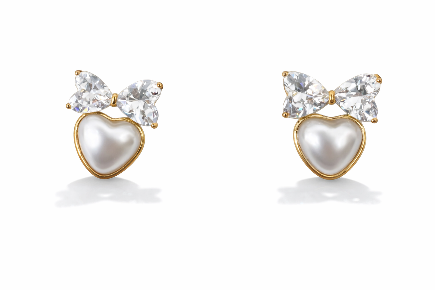 Bow modelling Heart-shaped pearl earrings