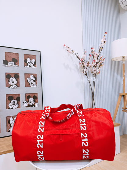 Carolina Herrera 212 travel bag
