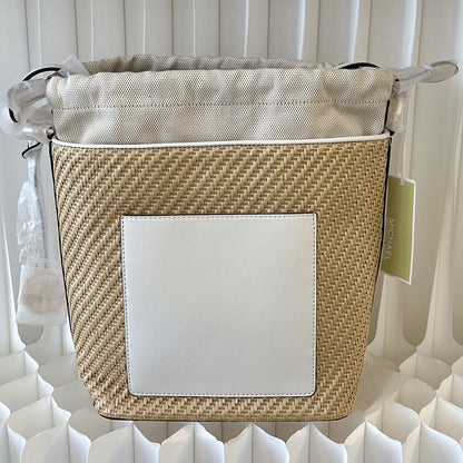 Michael Kors Eden straw drawstring bucket bag.