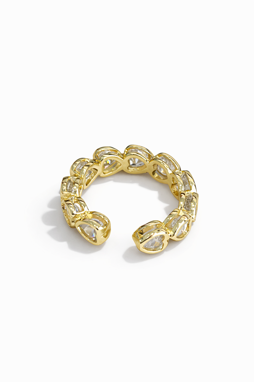 Gold heart-shaped gemstone opening ring