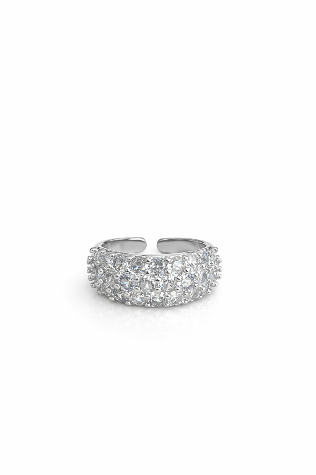 Three rows of diamond-encrusted open rings