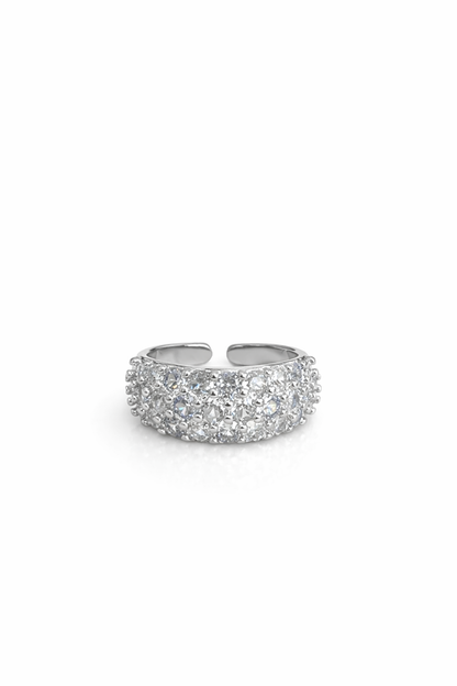 Three rows of diamond-encrusted open rings