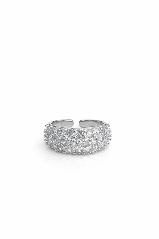 Three rows of diamond-encrusted open rings