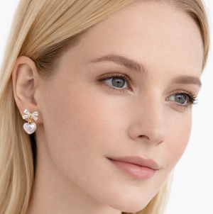 Heart-shaped opal and bow earrings