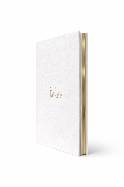 Dior White embossed notebook with the word J'adore