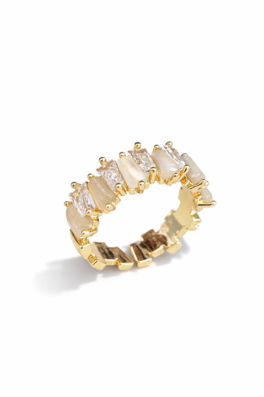 A golden open ring inlaid with zircon