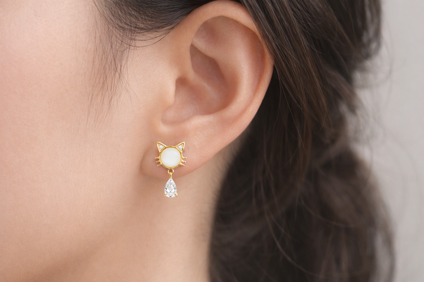Golden cat face earrings