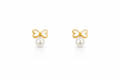 Gold bow pearl earrings