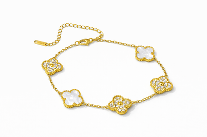 A four-leaf clover gold bracelet inlaid with white mother-of-the-shell