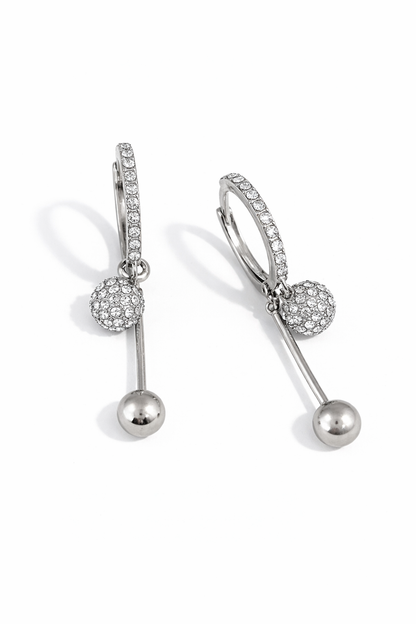 Diamond-encrusted spherical pendant earrings