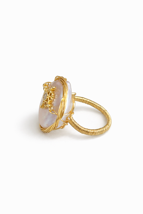Golden winding baroque pearl ring