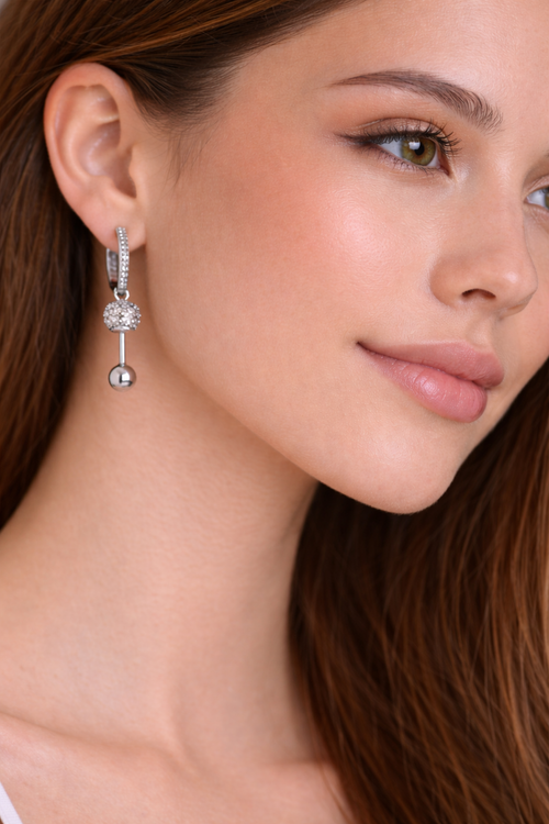 Diamond-encrusted spherical pendant earrings