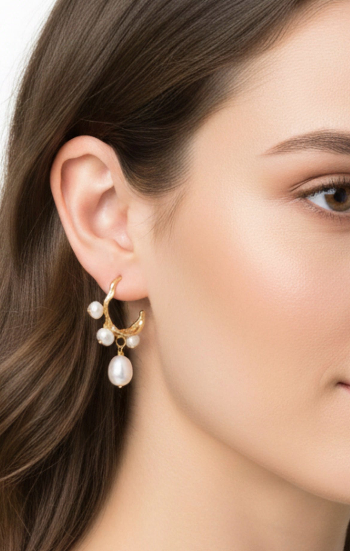 Gold irregular C-shaped baroque pearl earrings