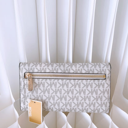 Michael Kors Jet Set Travel Large Trifold Wallet in Signature Vanilla