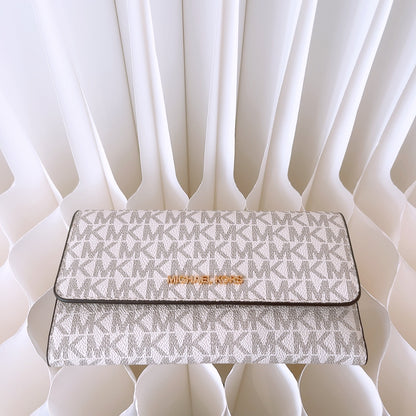 Michael Kors Jet Set Travel Large Trifold Wallet in Signature Vanilla